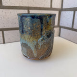 Relief Carved Bear & Sun Mug