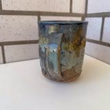 Relief Carved Bear & Sun Mug