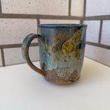 Relief Carved Bear & Sun Mug