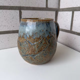 Relief Carved Mountain Mug