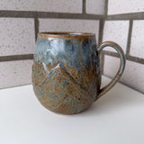 Relief Carved Mountain Mug