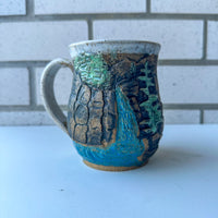 Relief Carved Waterfall Mug