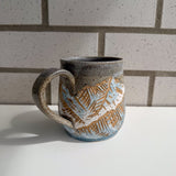 Carved mountains mug