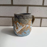 Carved mountains mug